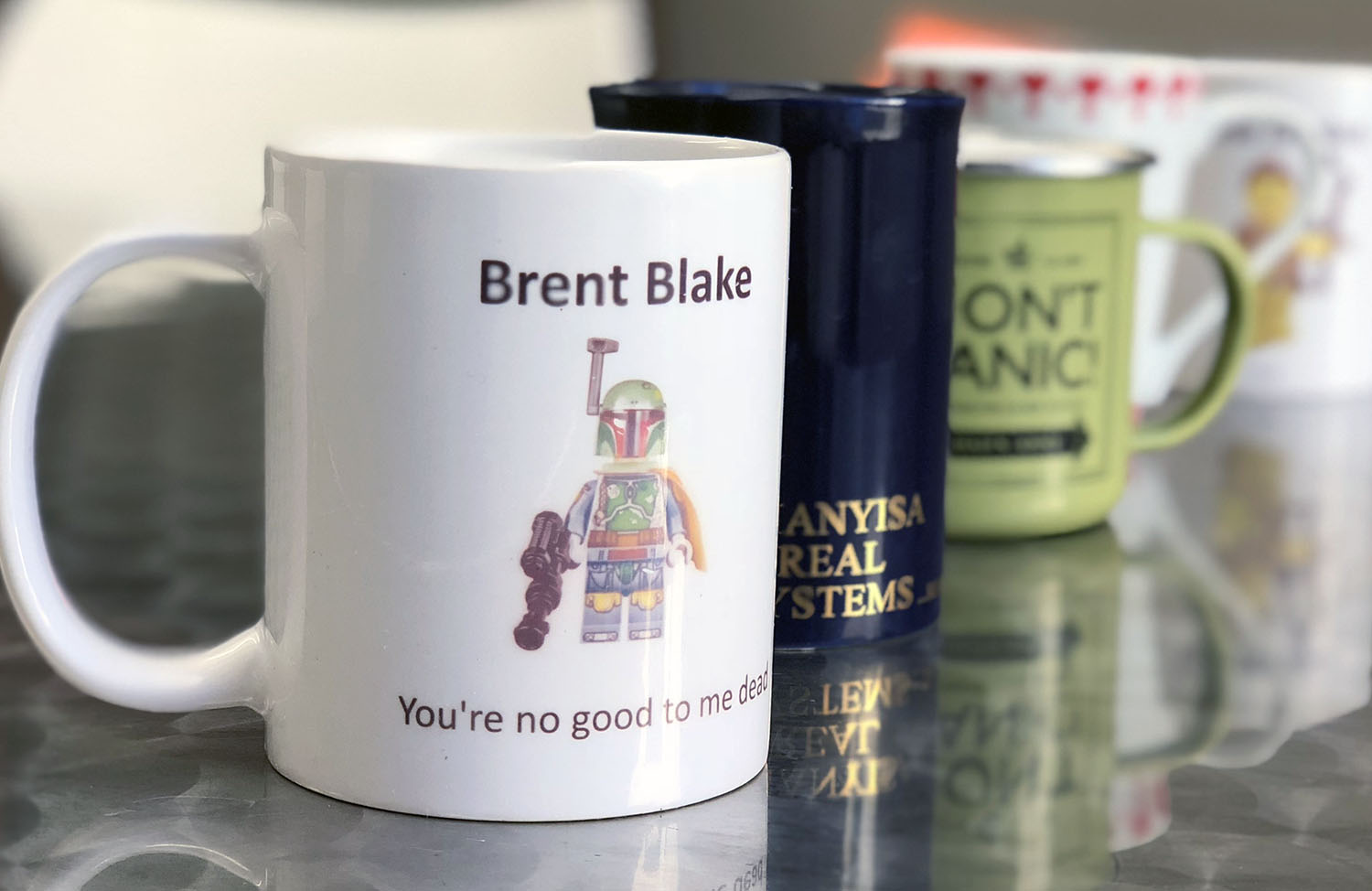 row of different coffee mugs