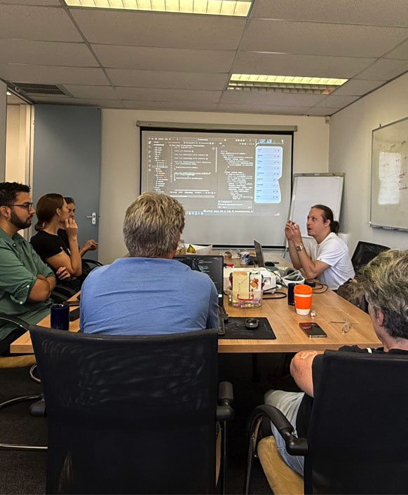 Photograph of several people attending a bootcamp or workshop at KRS